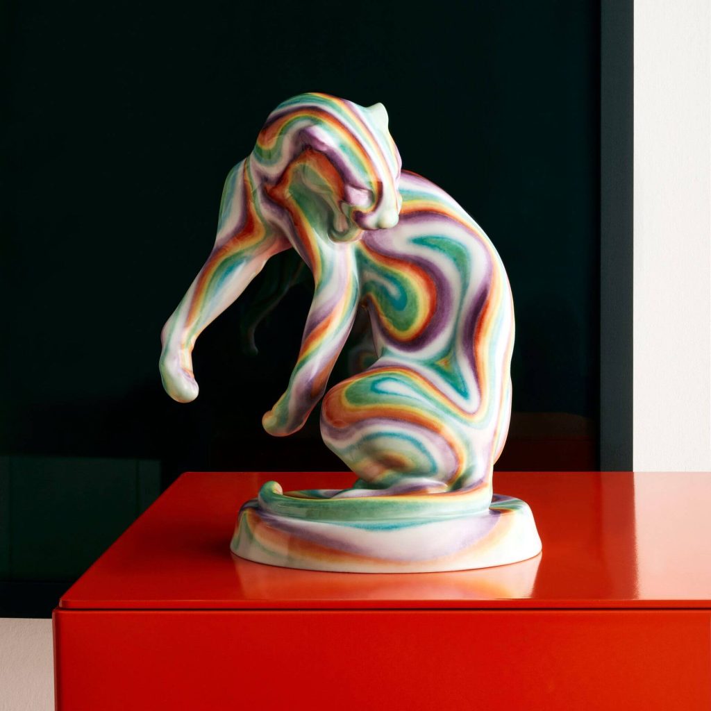 A porcelain panther from Meissen painted in psychedelic rainbows. 