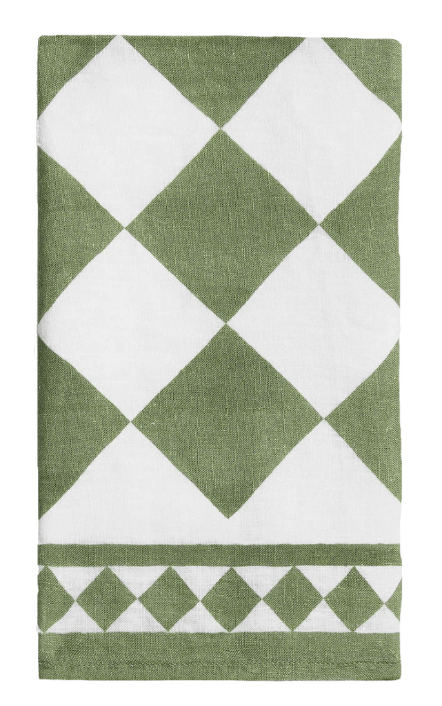 A green and white checkerboard linen napkin from Summerhill and Bishop in collaboration with Claridge's.