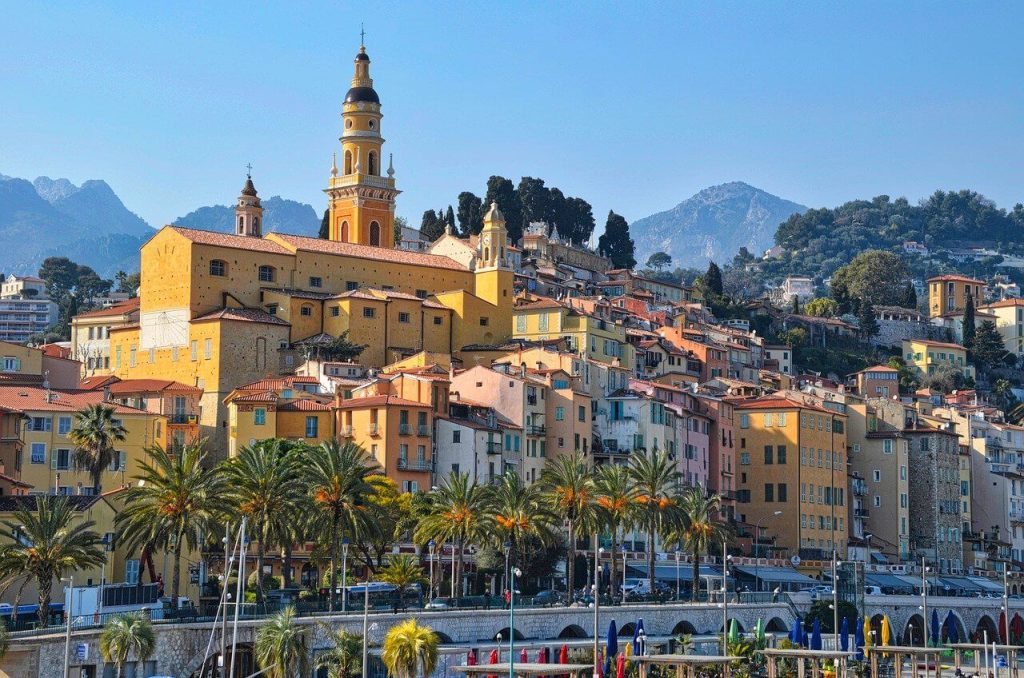 Colorful buildings along the French Riviera coast. 