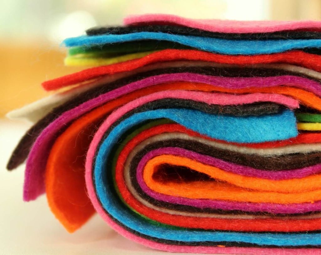 A stack of colorful felt squares.