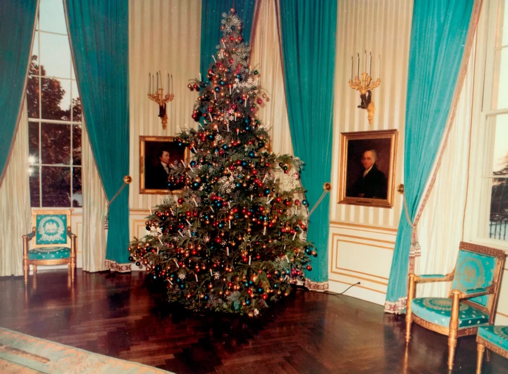 The more somber 1963 Christmas tree stand in the renovated Blue Room of the White House.