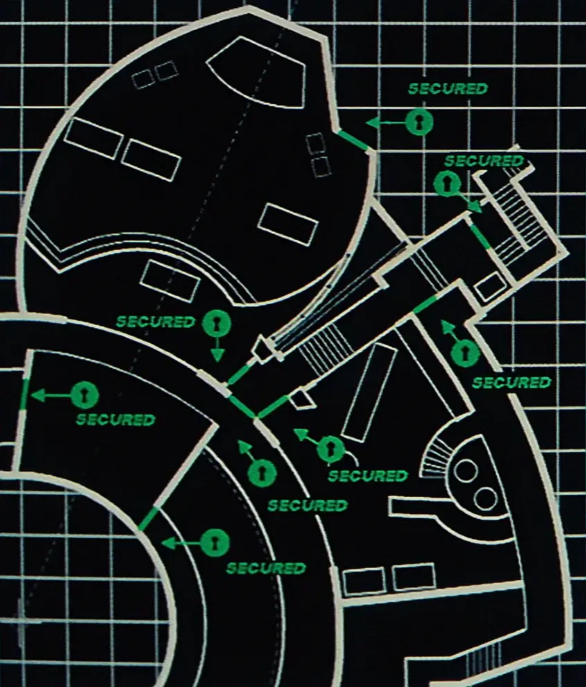 A diagram for Jurassic Park's operations center and theater ride shows the door locks, but does not indicate the rooms. 