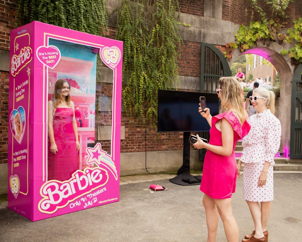 Barbie movie marketing promotion included a life-size doll box for photo ops.