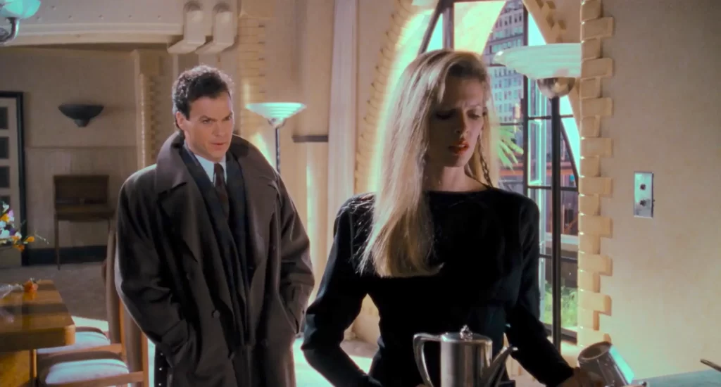 Bruce Wayne visits Vicki Vale at her apartment to tell her important things. 